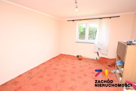 Działka z małym domkiem w Suchej